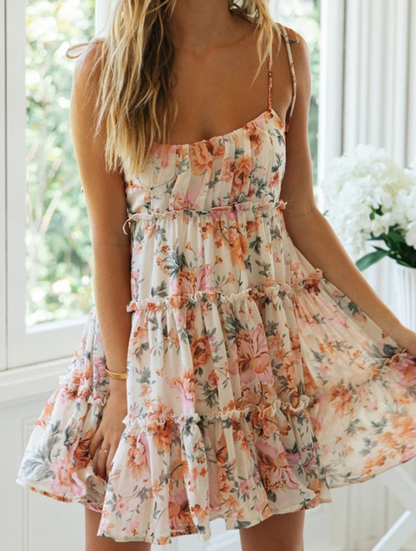 FJØRNA resort style white high-end short dress with vibrant print, perfect for summer or beachwear.