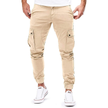 Slim-fit men's cargo jogging pants by FJØRNA with multiple pockets and a fur-lined interior, ideal for outdoor wear.