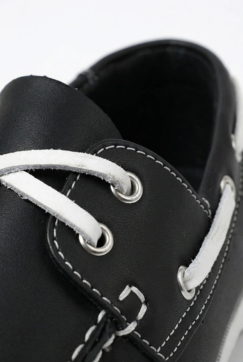 FJØRNA men's nautical boat shoes with PU upper, featuring classic deck shoe design in a refined spring style.