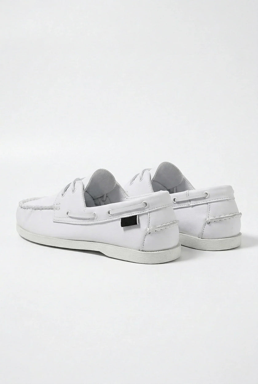 FJØRNA men's nautical boat shoes with PU upper, deck shoes design, featuring slip-on style and casual maritime-inspired footwear.