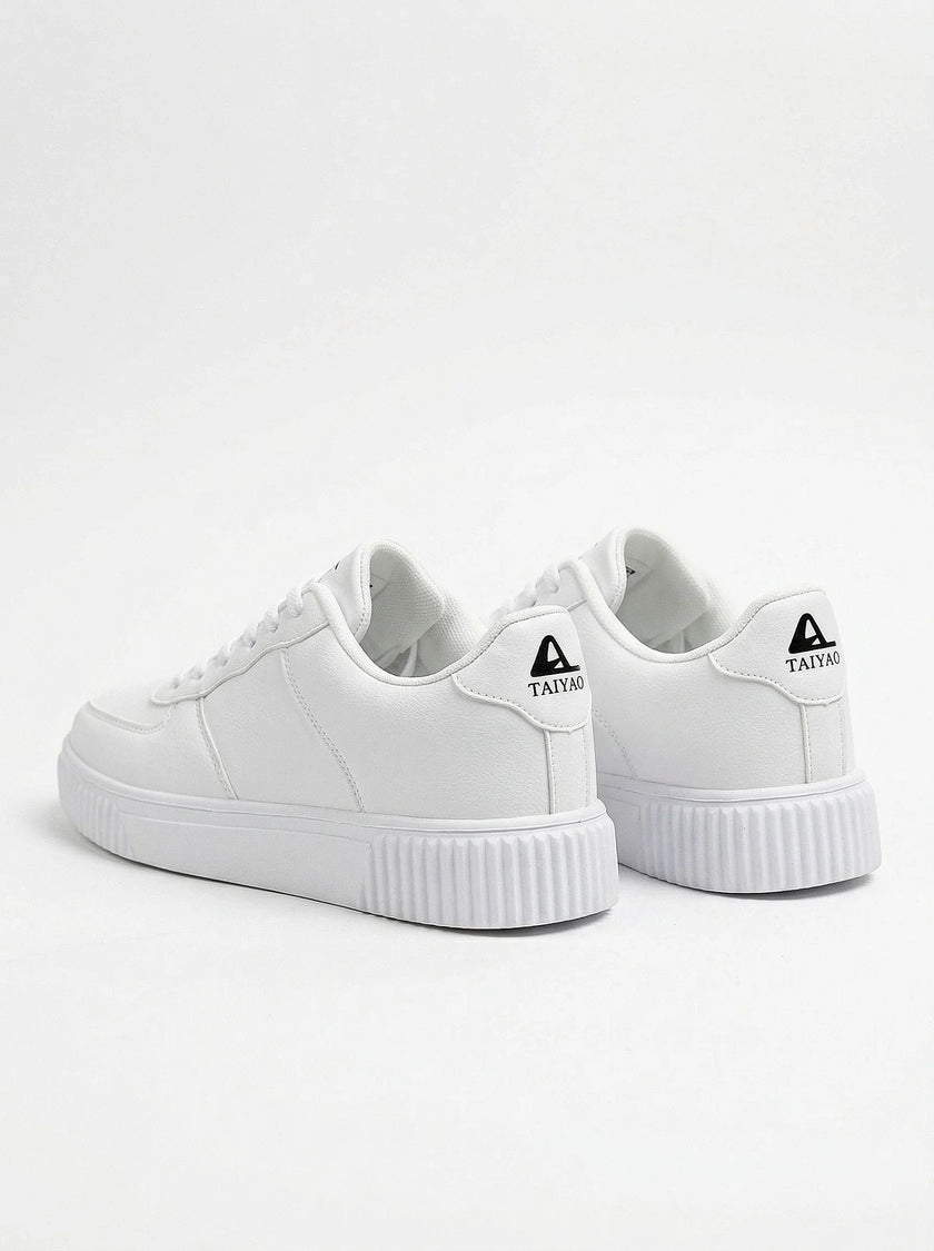 White breathable lace-up men's walking shoes by FJØRNA, lightweight casual sneakers with a comfortable design.