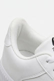 White breathable cushioned men's walking shoes by FJØRNA, lightweight casual sneakers with comfortable design and supportive sole.