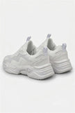 White mesh trainers for women by FJØRNA, lightweight and breathable casual shoes with a comfortable fit.