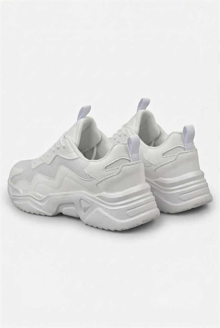 White mesh trainers for women by FJØRNA, lightweight and breathable casual shoes with a comfortable fit.