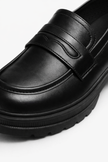 Women’s chunky platform loafers by FJØRNA featuring a block sole and casual style, perfect for spring outfits.