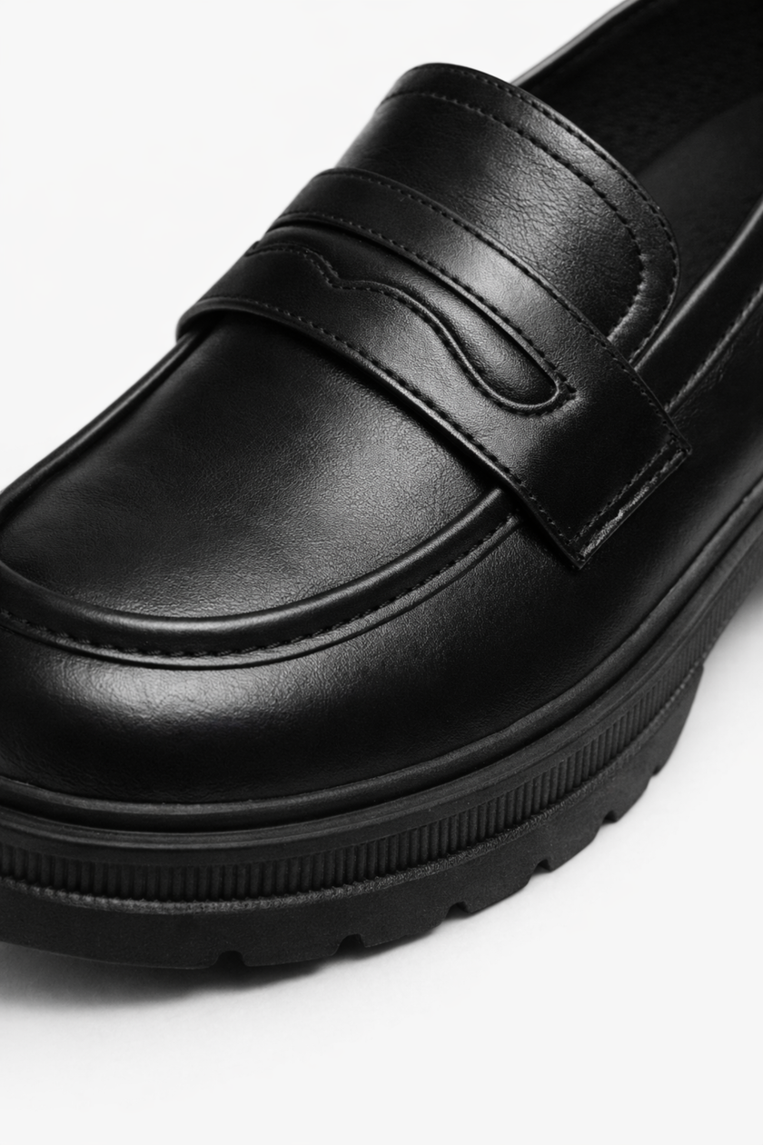 Women’s chunky platform loafers by FJØRNA featuring a block sole and casual style, perfect for spring outfits.
