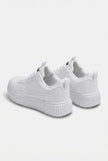White minimalist men's trainers by FJØRNA, casual everyday shoes with clean design and comfortable fit.