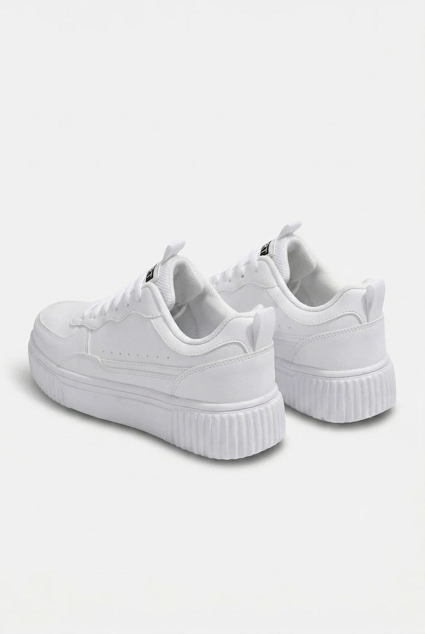 White minimalist men's trainers by FJØRNA, casual everyday shoes with clean design and comfortable fit.