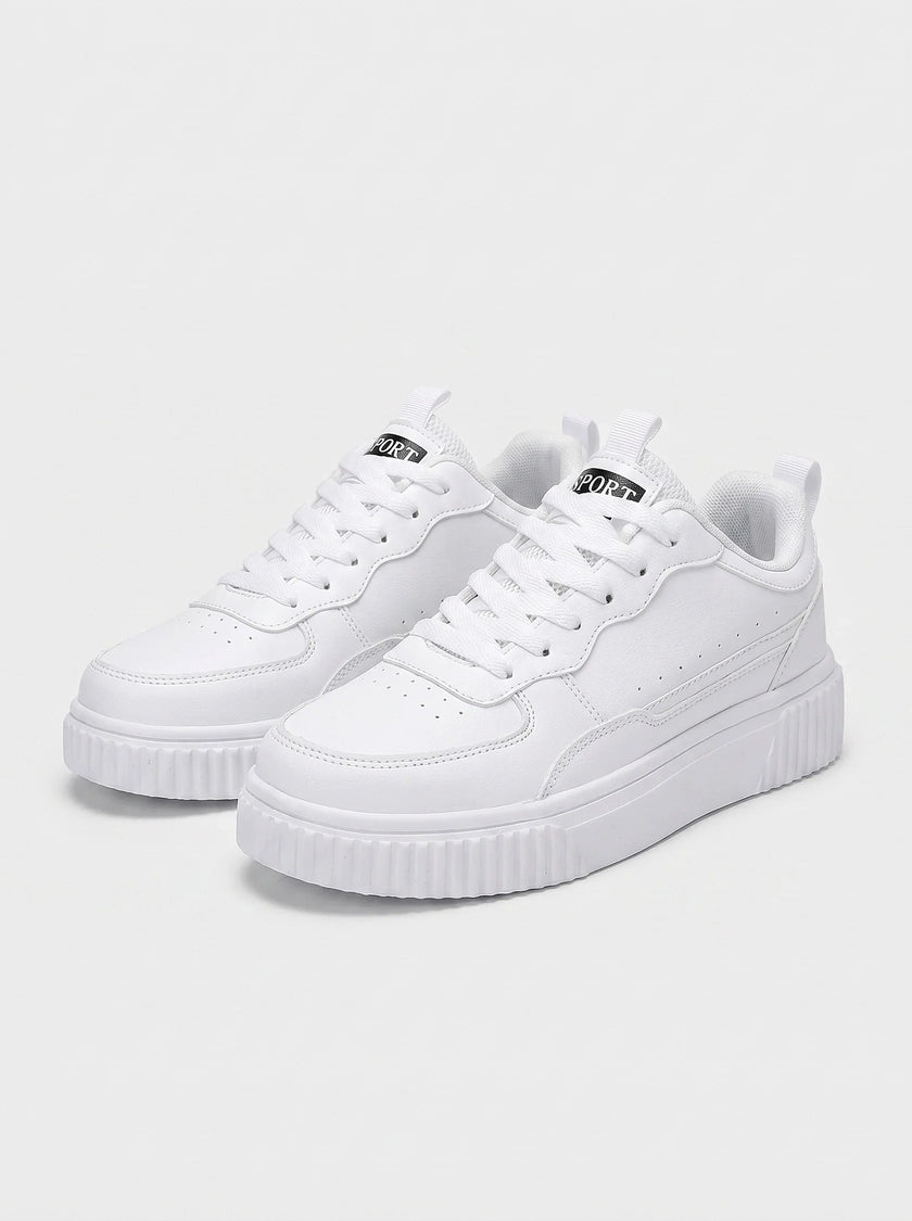 FJØRNA men's minimalist white trainers shoes with clean design, suitable for everyday casual wear, shown on a plain background.