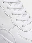 FJØRNA men's white minimalist casual trainers with clean design, suitable for everyday wear, shown from a side view.