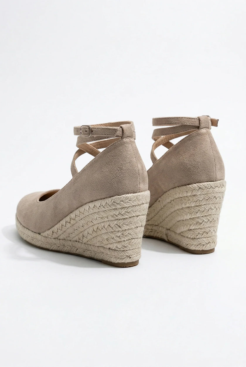Women's ankle-strap espadrille wedge sandals by FJØRNA, featuring platform style and elegant design, shown from side view.