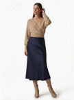 FJØRNA satin high-waist flowing midi skirt for women, elegant pencil style with smooth fabric and a sophisticated silhouette.