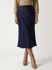 FJØRNA satin high-waist flowing midi skirt for women, elegant pencil style in smooth satin fabric, shown in a stylish shot.