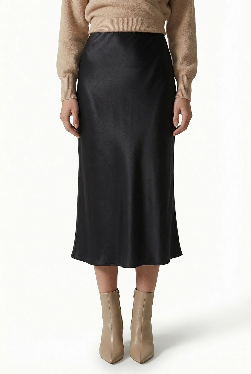 FJØRNA satin high-waist flowing midi skirt for women, elegant pencil style in a smooth, shiny fabric with a flattering fit.
