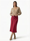FJØRNA satin high-waist flowing midi skirt for women, elegant pencil style in a soft, shiny fabric, shown in variant four.