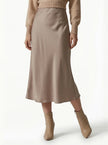 FJØRNA satin high-waist midi pencil skirt for women, flowing and elegant, shown in a flowing satin fabric on a model.