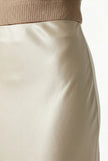 FJØRNA satin high-waist flowing midi skirt for women, elegant pencil style, smooth fabric, and flattering fit.