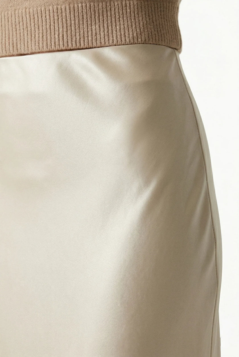 FJØRNA satin high-waist flowing midi skirt for women, elegant pencil style, smooth fabric, and flattering fit.