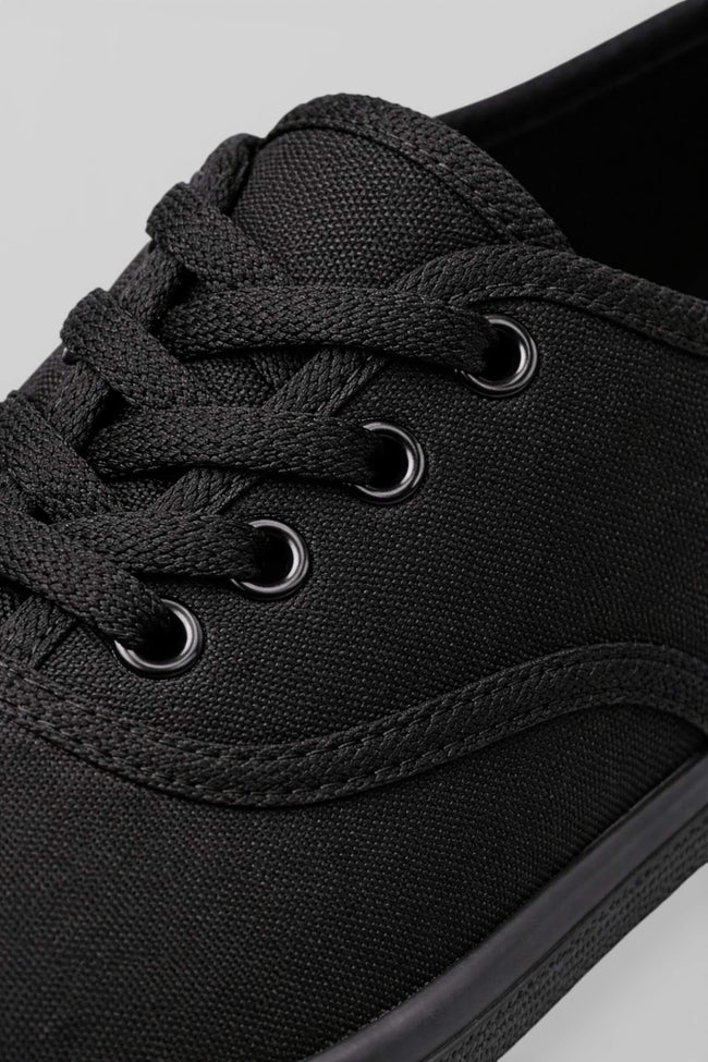 Black breathable lightweight women's trainers by FJØRNA, casual shoes with comfortable, breathable fabric and sleek design.
