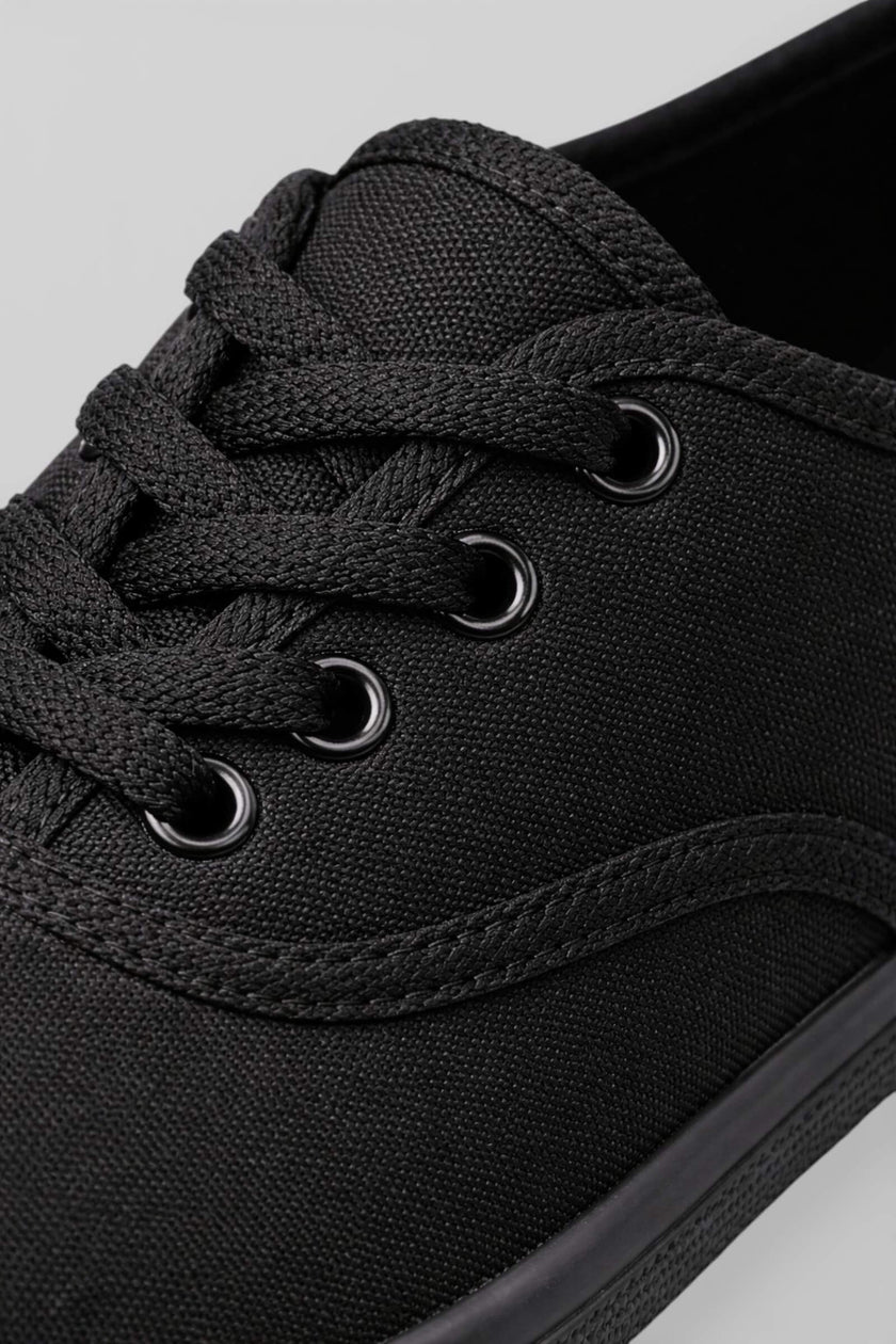 Black breathable lightweight women's trainers by FJØRNA, casual shoes with comfortable, breathable fabric and sleek design.