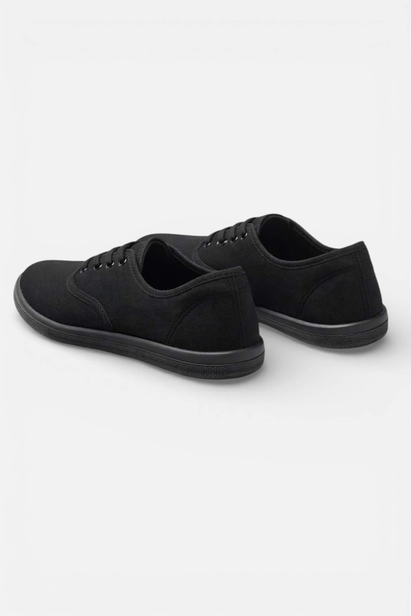 Black FJØRNA women’s breathable lightweight casual trainers with cushioned soles and sleek design for comfortable everyday wear.