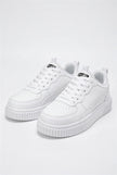 White FJØRNA women's breathable casual trainers with lightweight design, shown from a side angle on a plain background.