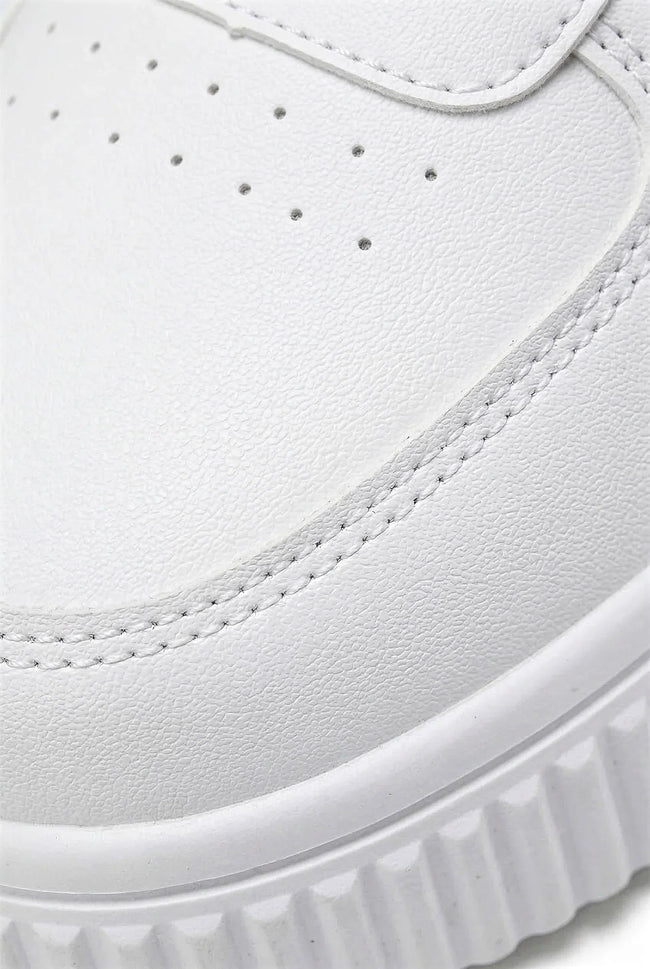 White breathable FJØRNA women's casual trainers with lightweight design, ideal for everyday comfort and casual wear.