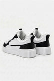 FJØRNA white minimalist men's trainers, lightweight casual sneakers shown from side view, perfect for everyday wear.