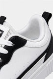 White breathable FJØRNA women's lightweight casual trainers, showing side view of comfortable everyday shoes for women.