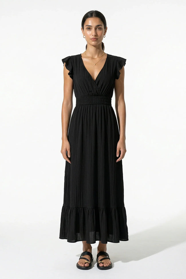 Black FJØRNA women's midi dress with flowing sleeveless design, perfect for elegant everyday wear.