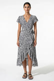 Elegant floral midi dress for women by FJØRNA, featuring an A-line silhouette in black and white for casual summer wear.