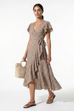 FJØRNA floral midi dress for women, camel-colored A-line casual summer dress with a floral pattern, full body view.