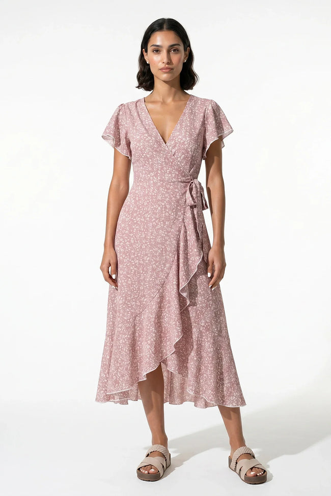 Pink floral midi dress for women by FJØRNA, featuring an elegant A-line design perfect for casual summer wear.