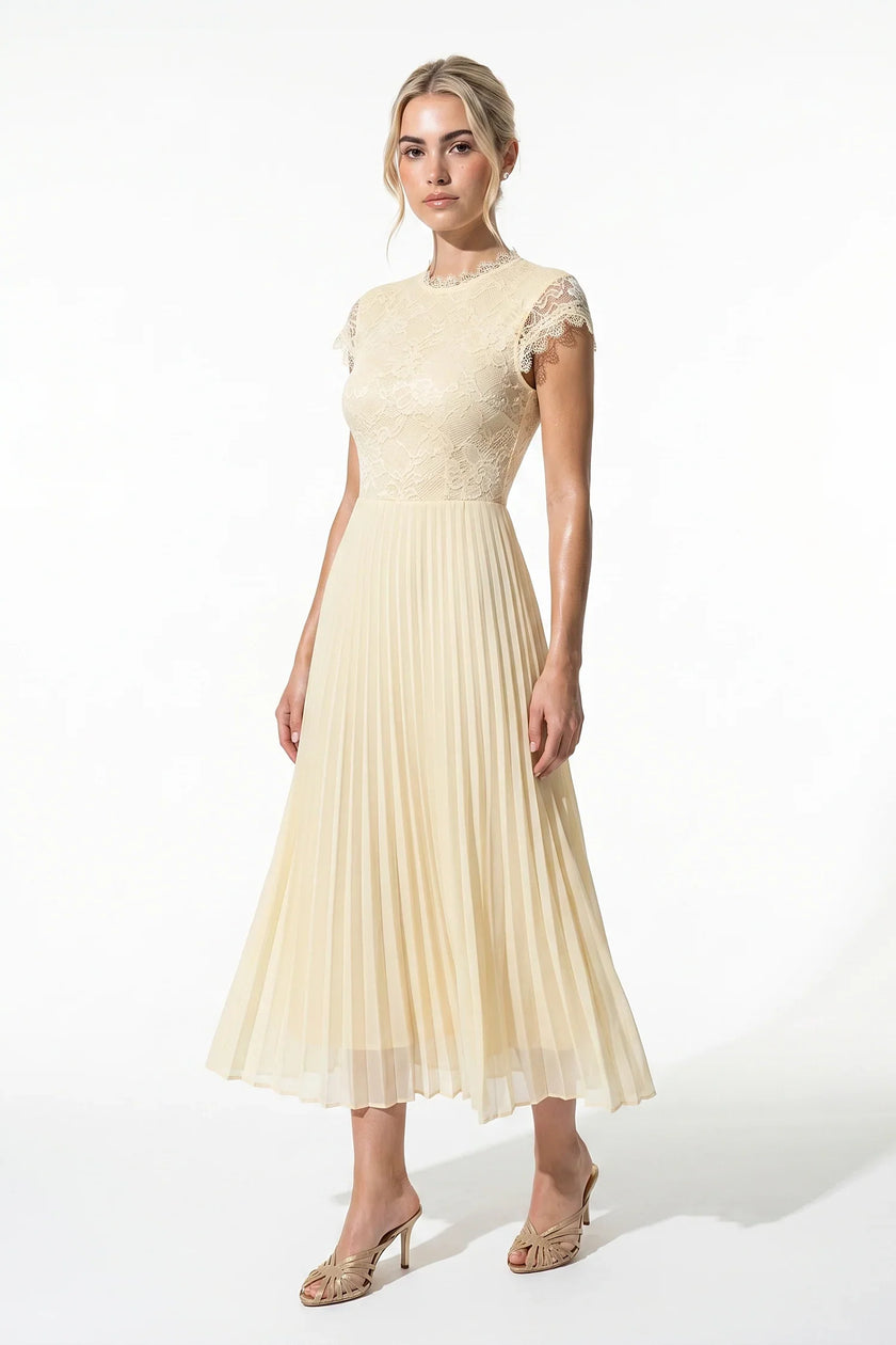 FJØRNA floral lace pleated A-line maxi dress in champagne, elegant summer wedding guest dress, full-body view.