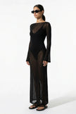 Black women's long-sleeve flowing maxi dress by FJØRNA, perfect for summer beachwear, shown as a full-body view.