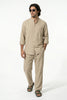 Men's linen co-ord set by FJØRNA featuring a khaki shirt and matching trousers, perfect for summer casual wear.