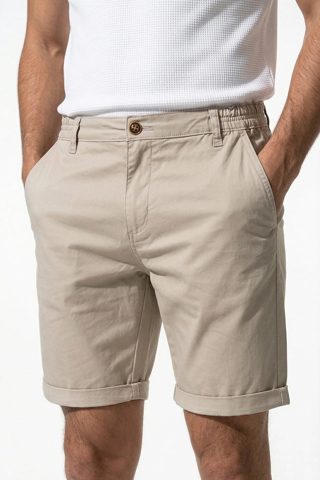 Men's FJØRNA cotton tailored chino shorts in champagne color, showcasing a relaxed fit and casual style perfect for warm weather.