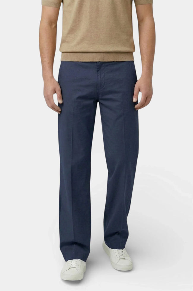 Men's straight fit stretch chino trousers by FJØRNA, tailored slim fit pants for men showcasing the front view.