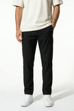 Men's slim fit stretch chino trousers in black by FJØRNA, showcasing sleek, tailored design and comfortable fit for stylish casual wear.