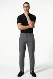 Men's dark grey slim fit stretch chino trousers by FJØRNA, shown as full body view, tailored and versatile for casual or smart wear.