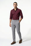 Men's slim fit stretch chino trousers in light grey by FJØRNA, shown as full-body view, highlighting tailored slim fit design.