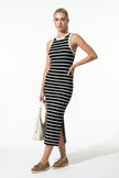 Black ribbed midi dress by FJØRNA, sleeveless, slim fit, casual women’s dress shown full body view.