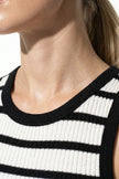 White ribbed midi dress by FJØRNA, sleeveless and slim fit, ideal for casual wear and stylish summer looks.