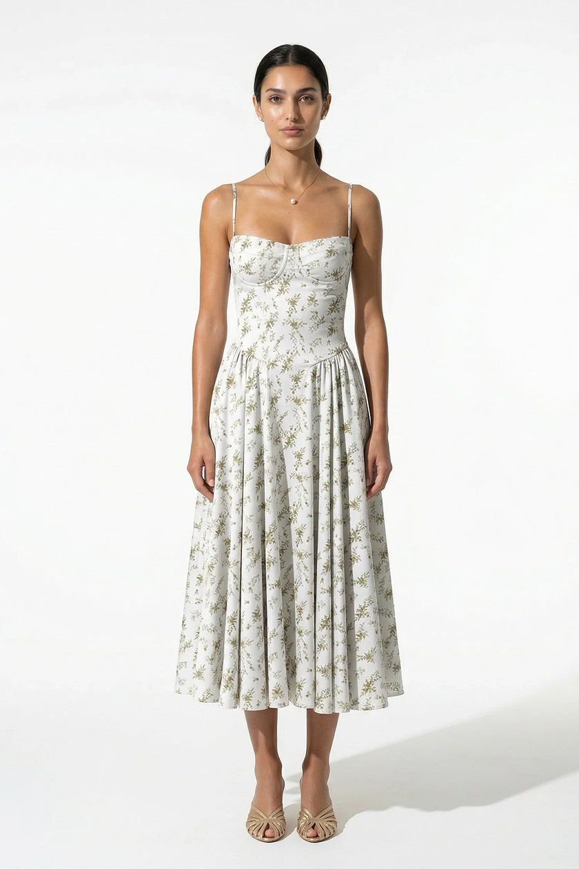 FJØRNA floral midi dress for women, sleeveless lightweight summer dress with green floral pattern on smooth fabric.