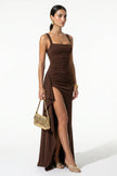 FJØRNA black sleeveless high-slit maxi dress for women, full-length view showcasing elegant, flowing design and fitted waist.