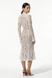 Back view of FJØRNA white lace midi dress for women, long sleeve fitted dress with intricate lace details.
