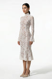 Side view of FJØRNA white lace midi dress for women with long sleeves, fitted silhouette and elegant design.