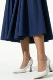 FJØRNA women's sleeveless deep blue pleated halter backless midi dress, stylish occasion dress with elegant pleats.