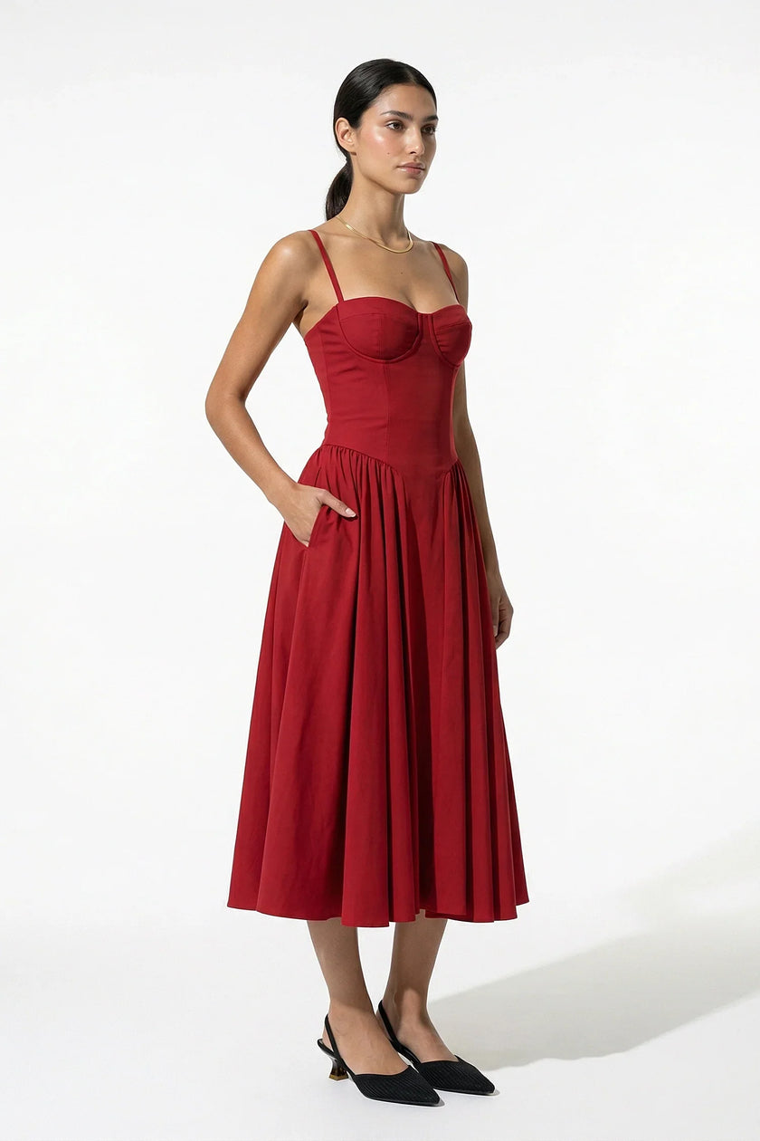 Red FJØRNA pleated halter backless midi dress, sleeveless occasion dress shown from full body, elegant and stylish for events.