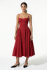 Red FJØRNA sleeveless pleated halter backless midi dress, elegant occasion dress with a flowing silhouette and sleeveless design.